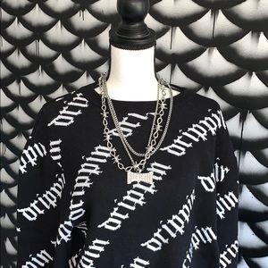 “Drippin” long sleeve knit sweater